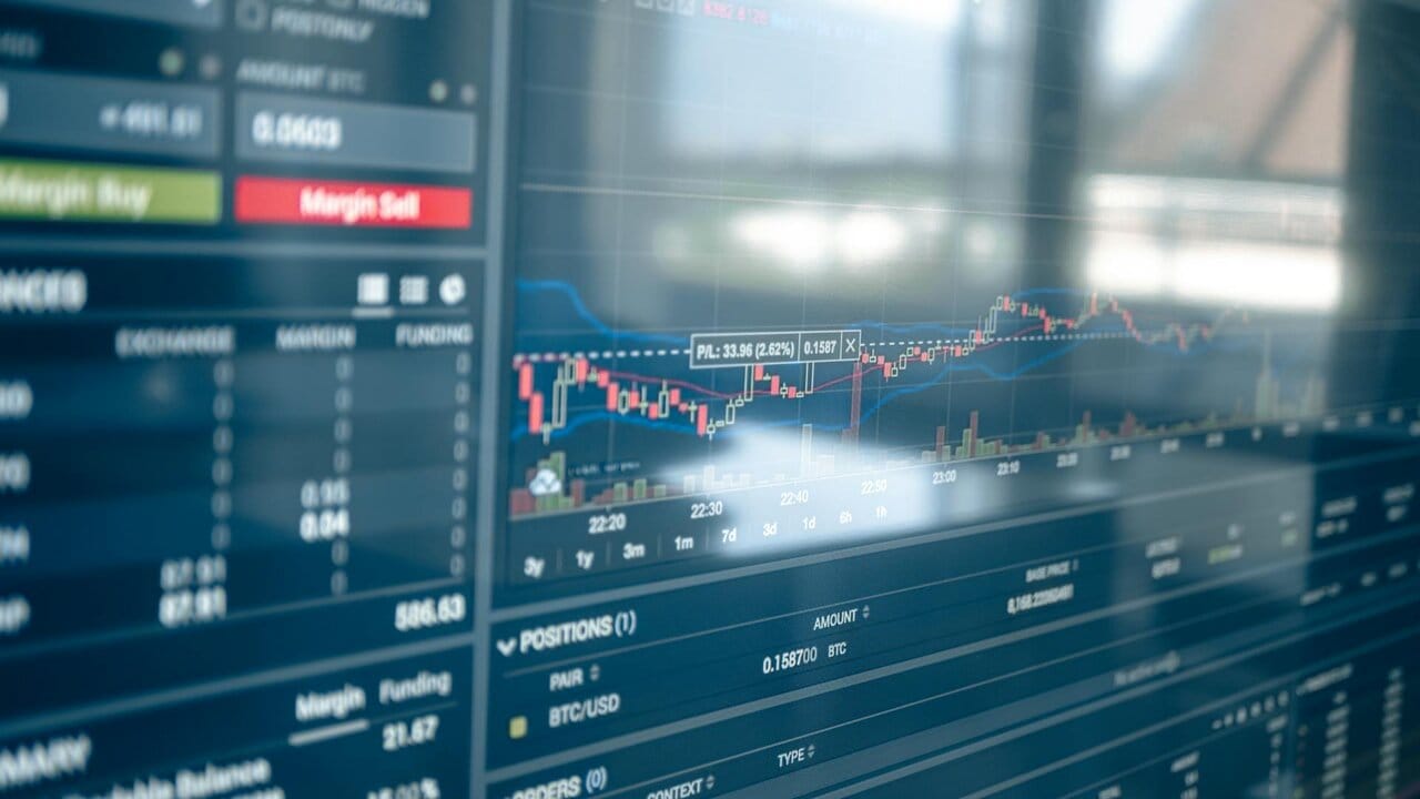 Cryptocurrency price charts displayed on a trading screen.