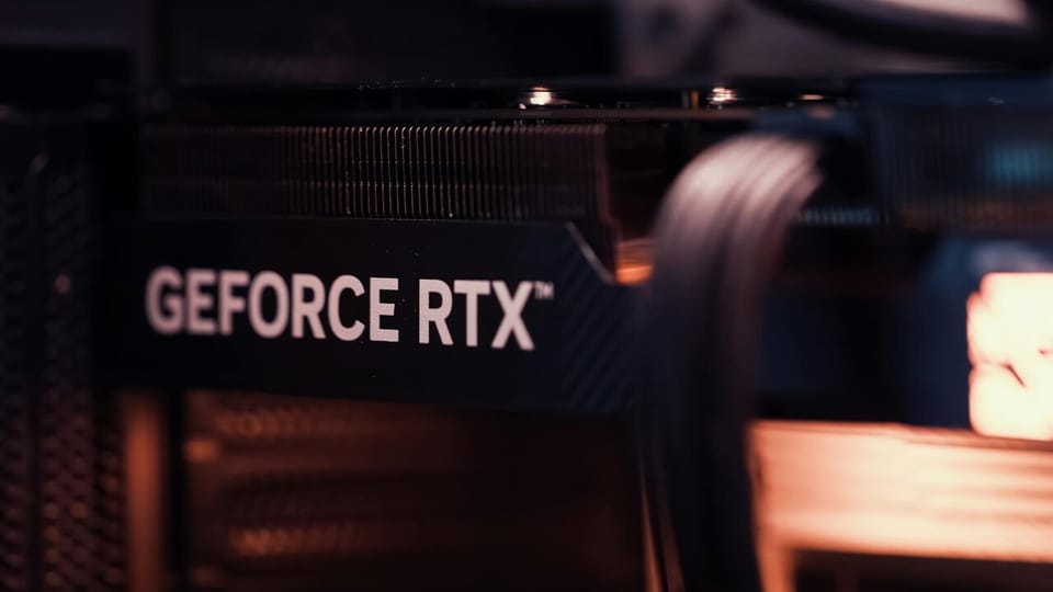 Close-up of a GeForce RTX graphics card with the brand mark visible.
